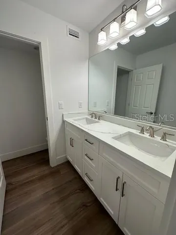 a view of a big room with windows