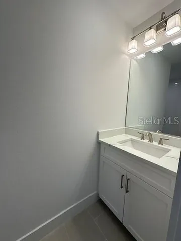 an empty room with a empty space and a window