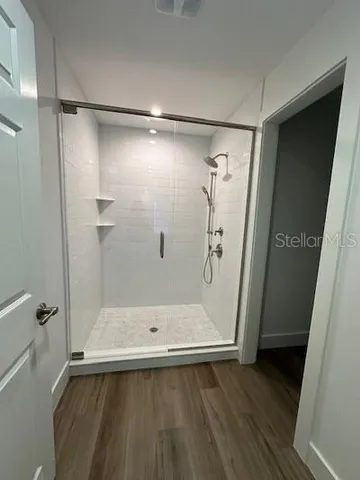 a swimming pool with an outdoor seating