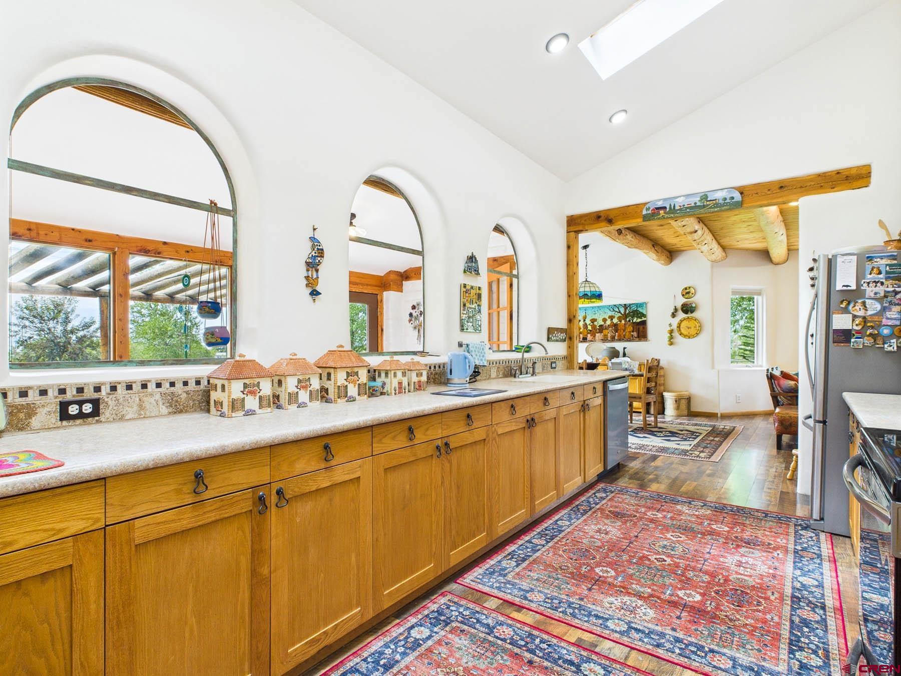19550 2325th Road Cedaredge, CO 81413 - Photo 16 of 45 a large living room with a large window