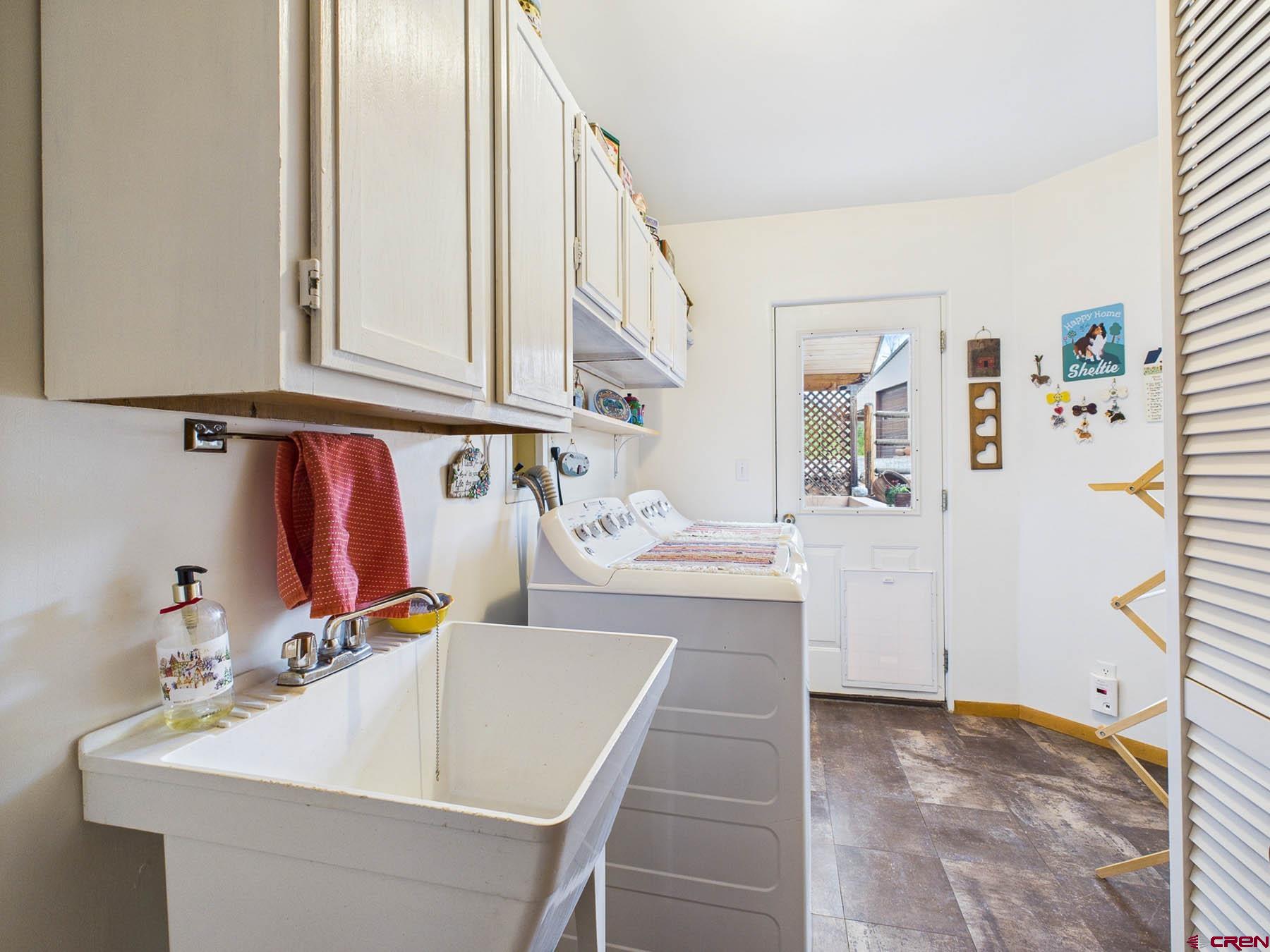 19550 2325th Road Cedaredge, CO 81413 - Photo 20 of 45 a bathroom with a sink and a mirror