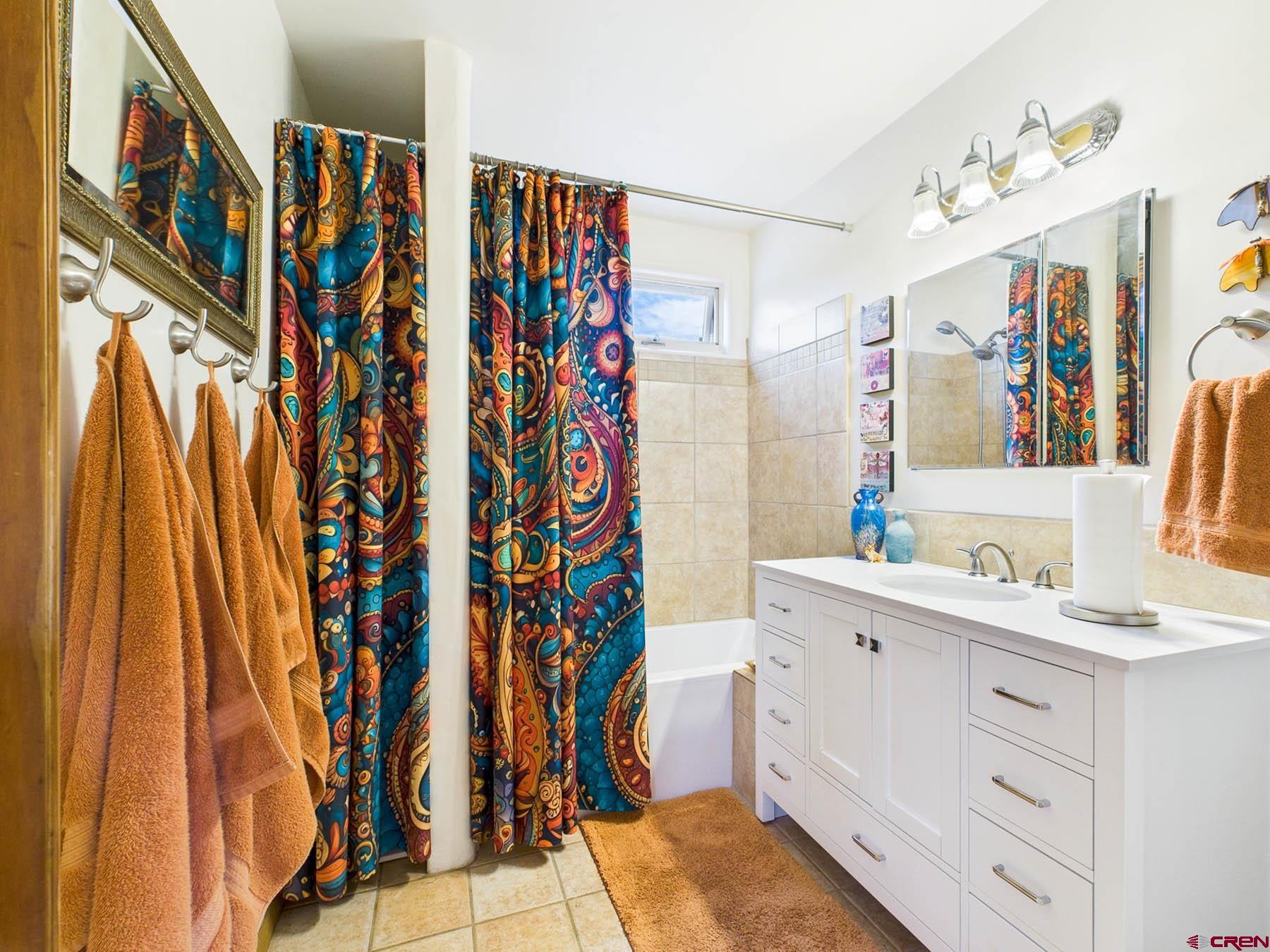 19550 2325th Road Cedaredge, CO 81413 - Photo 26 of 45 a view of walk in closet with clothes