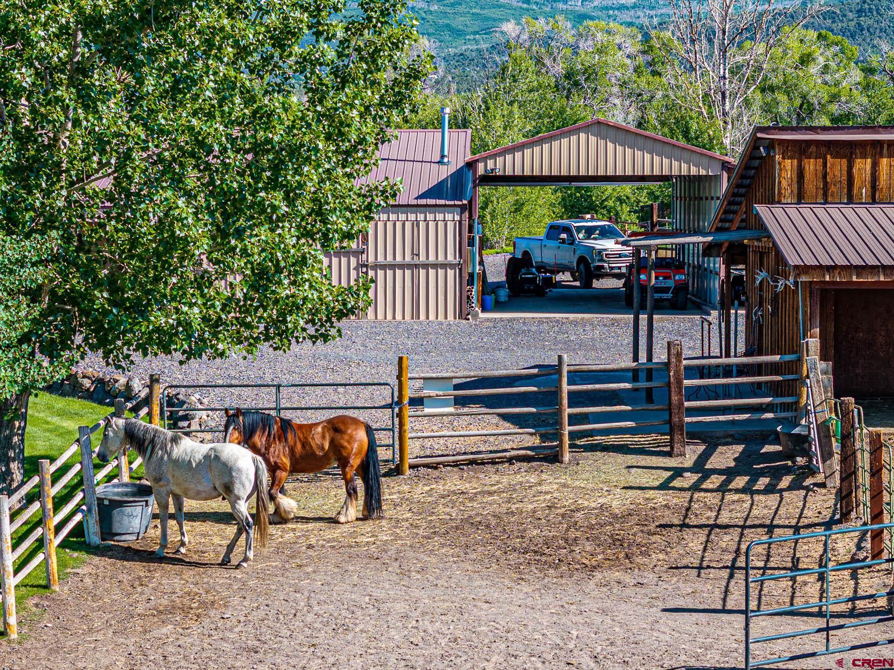19550 2325th Road Cedaredge, CO 81413 - Photo 30 of 45 a view of a chairs setting on the deck