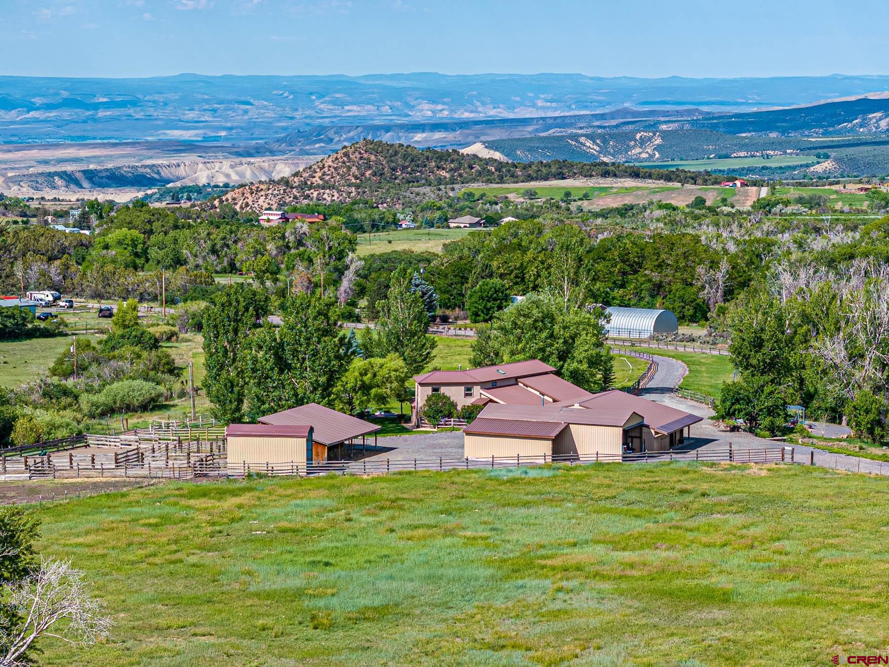 19550 2325th Road Cedaredge, CO 81413 - Photo 31 of 45 a view of a city from a yard