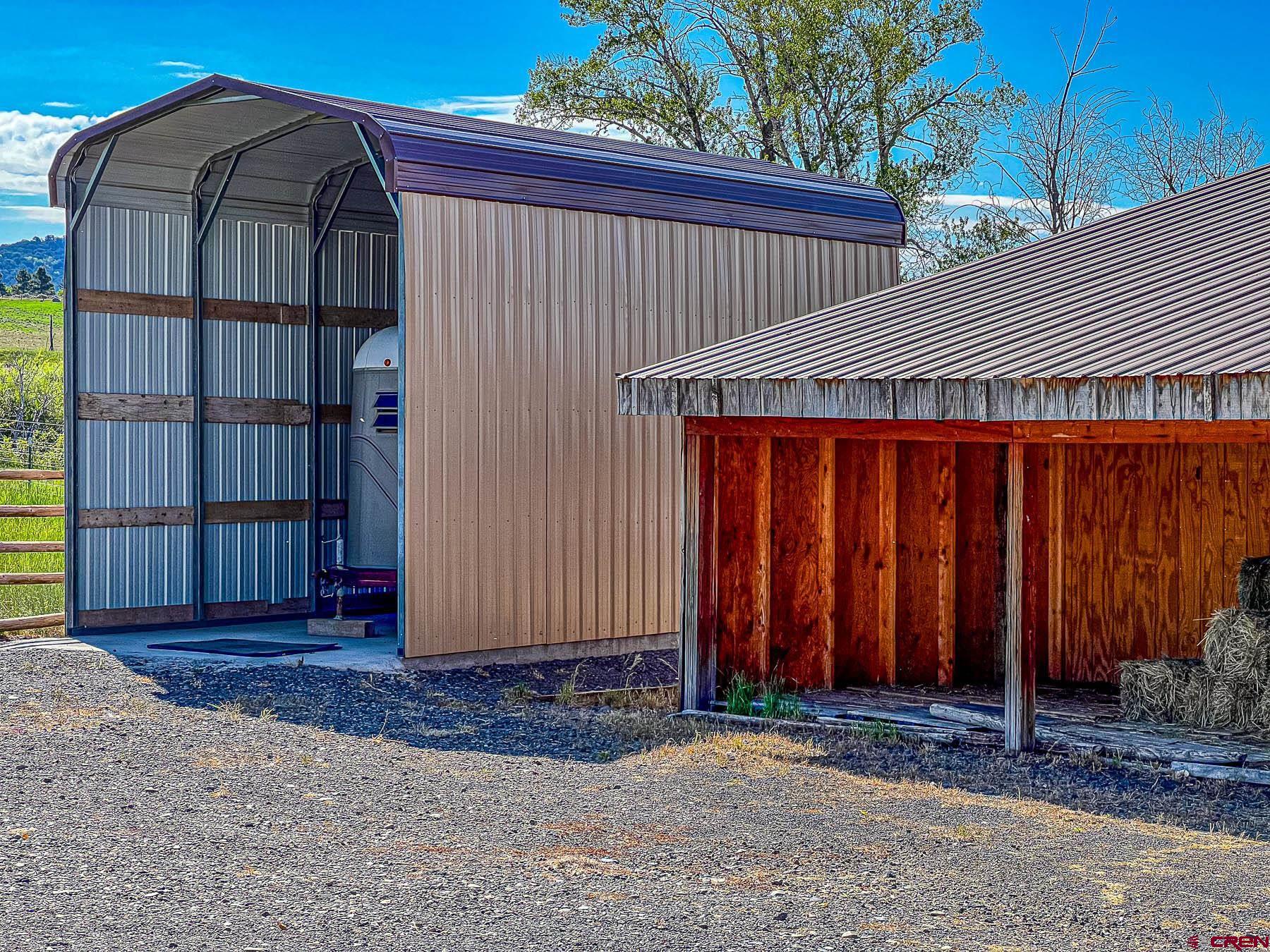 19550 2325th Road Cedaredge, CO 81413 - Photo 35 of 45 a view of a house with wooden fence