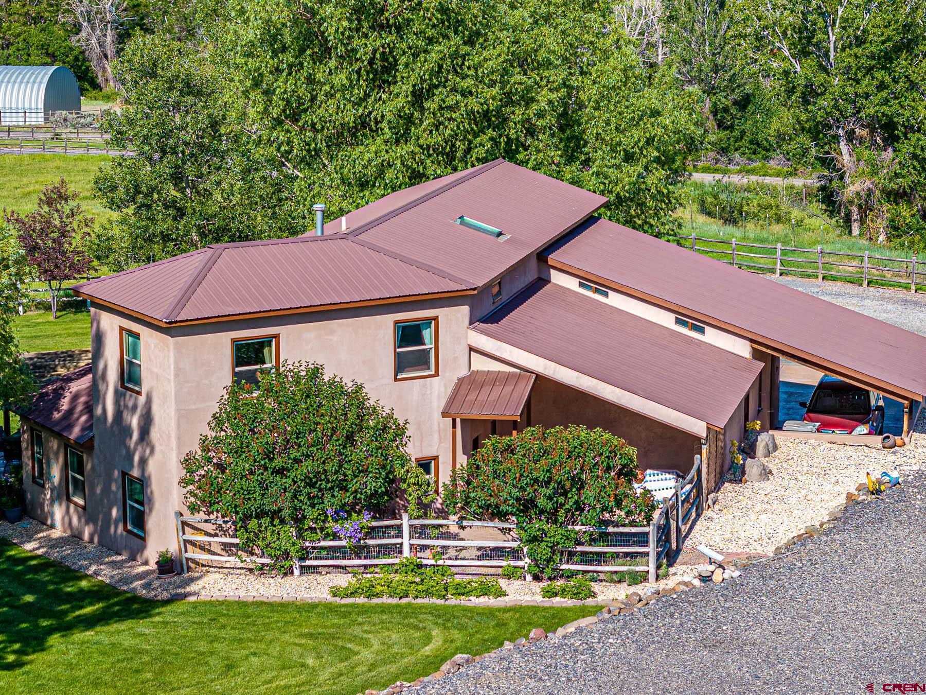 19550 2325th Road Cedaredge, CO 81413 - Photo 8 of 45 a view of a house with a yard