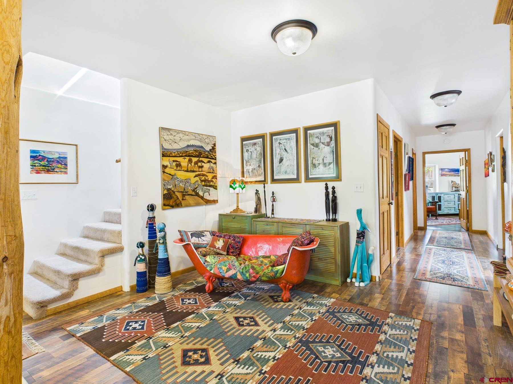 19550 2325th Road Cedaredge, CO 81413 - Photo 9 of 45 a living room with furniture and a rug