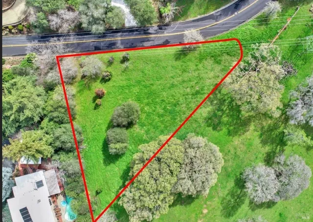 a view of swimming pool with a yard