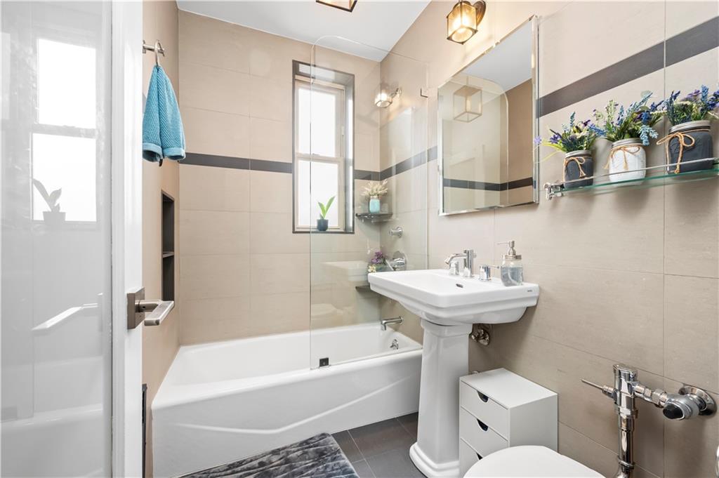 9425 Shore Road, Unit 3B Brooklyn, NY 11209 - Photo 13 of 21 Window in the bathroom