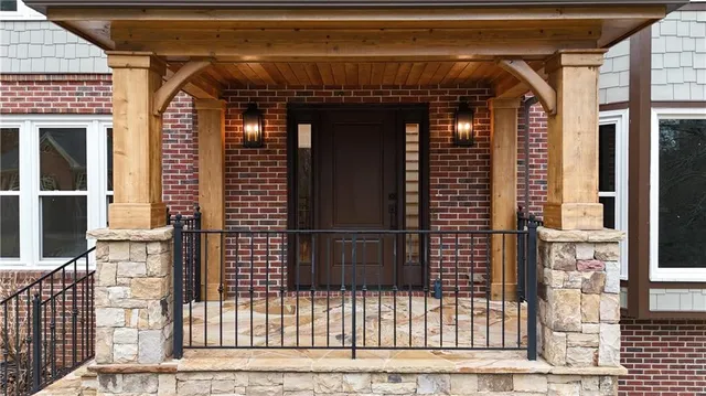 a front view of a house with a glass door