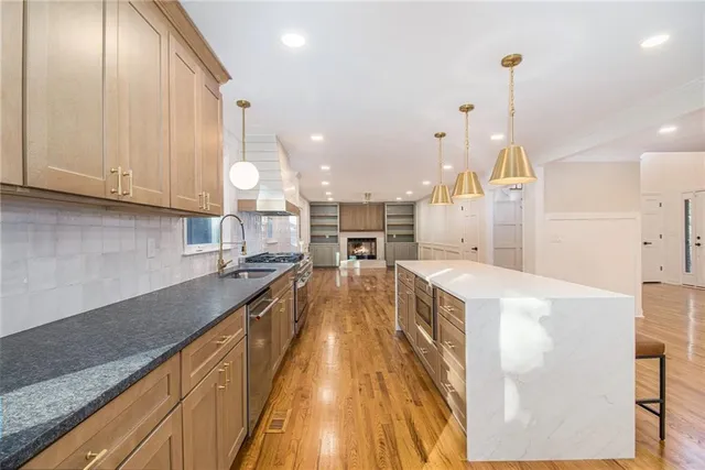 a large kitchen with cabinets