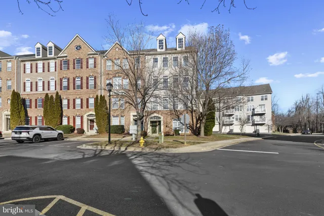 a view of a building with a street
