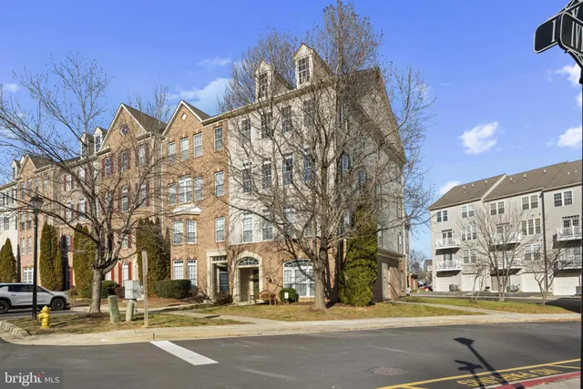 a view of a building with a street
