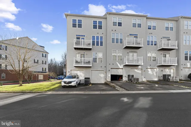 a cars parked in front of a building