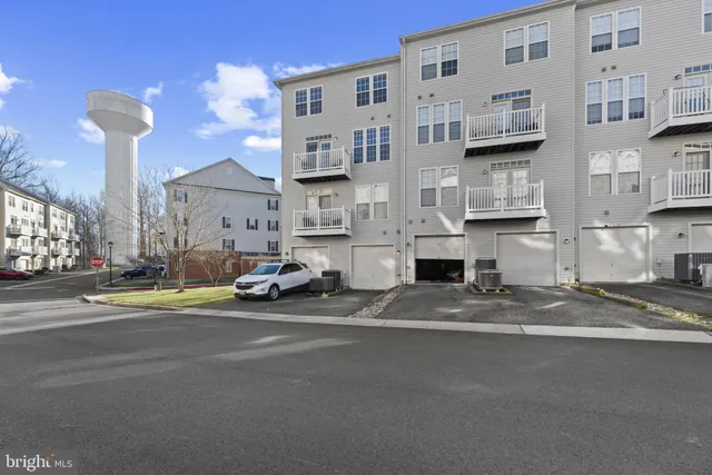 a view of street with parked cars