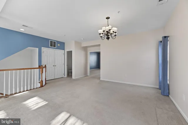 a view of livingroom with chandelier
