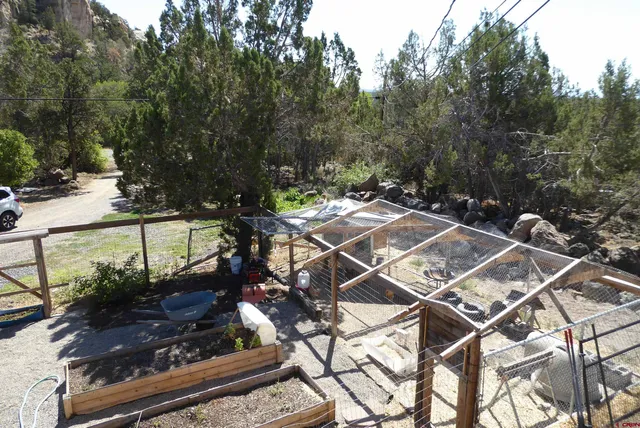 a patio with a table and chairs
