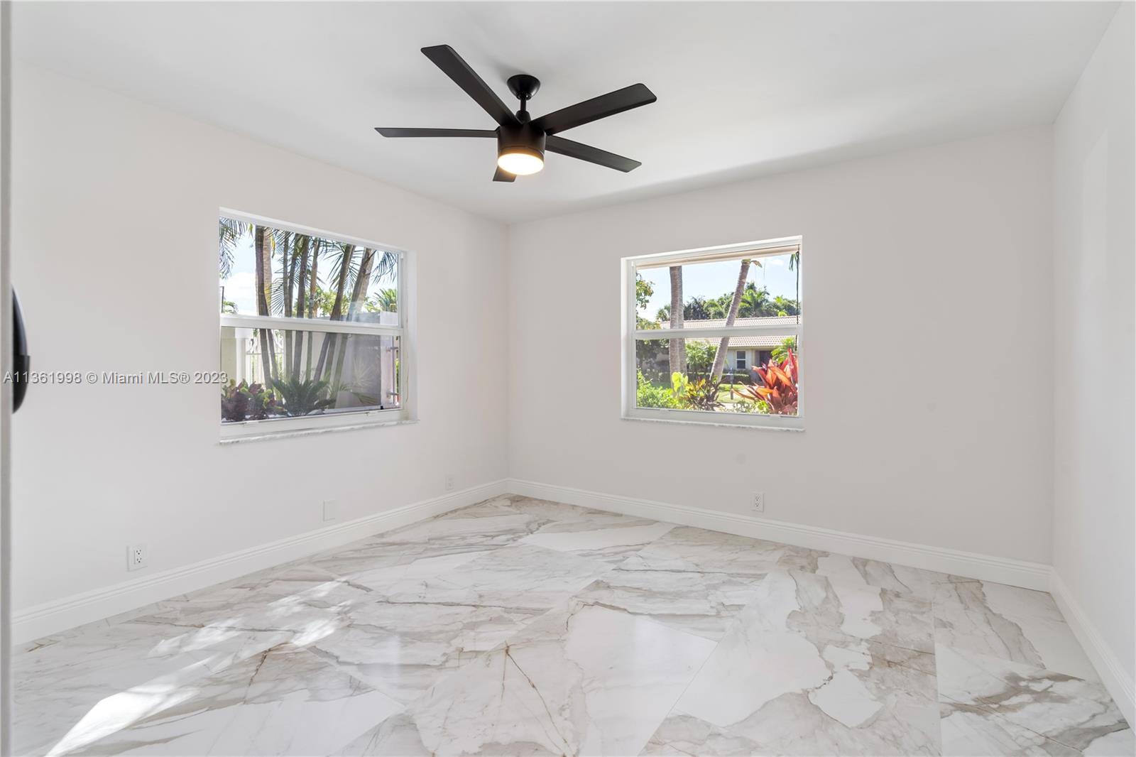 721 Southwest 15th Street Boca Raton, FL 33486 - Photo 23 of 46 a view of a livingroom with a window