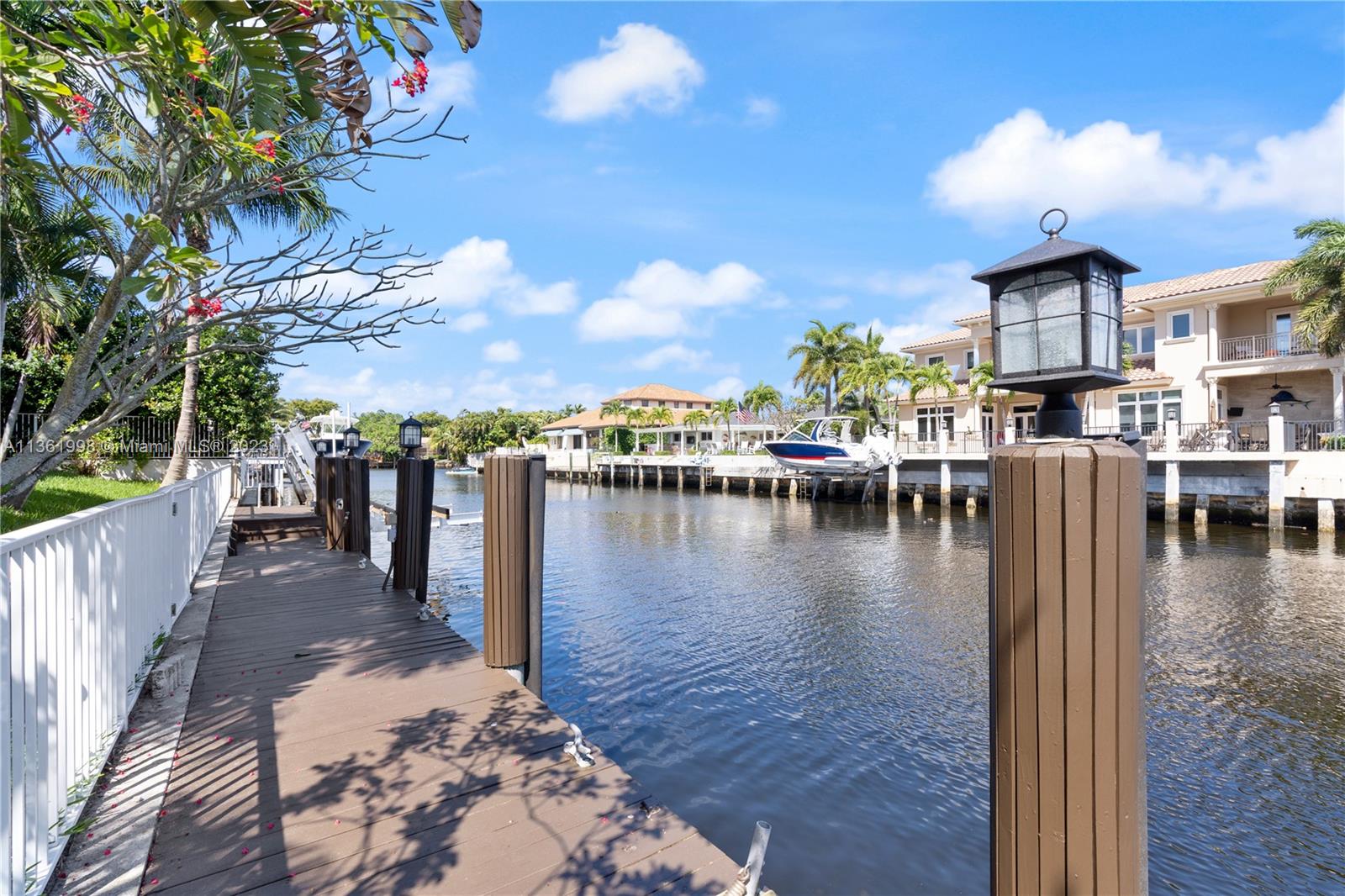 721 Southwest 15th Street Boca Raton, FL 33486 - Photo 41 of 46 a view of a lake with boats and wooden floor