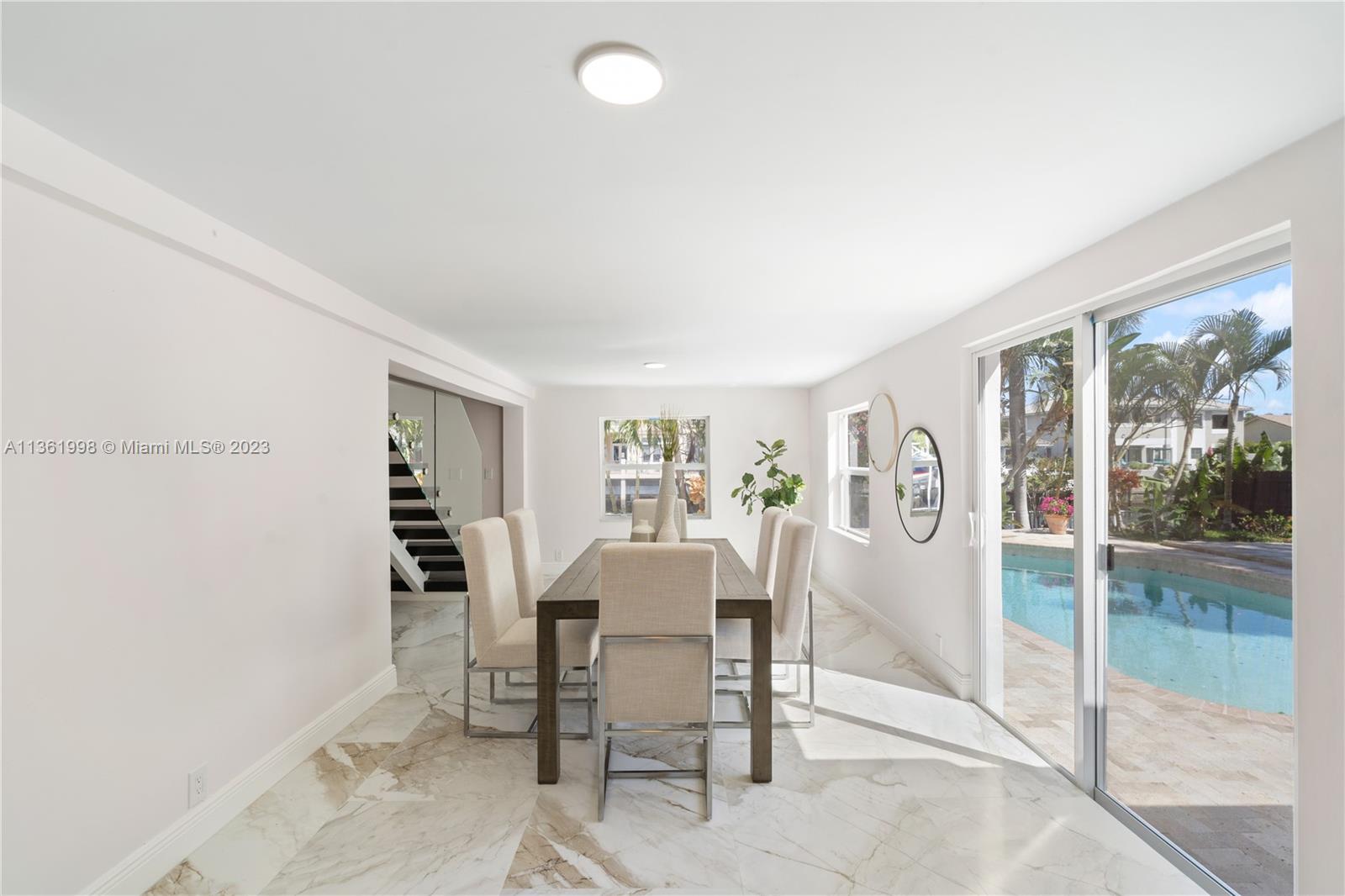 721 Southwest 15th Street Boca Raton, FL 33486 - Photo 8 of 46 a dining room with furniture and window