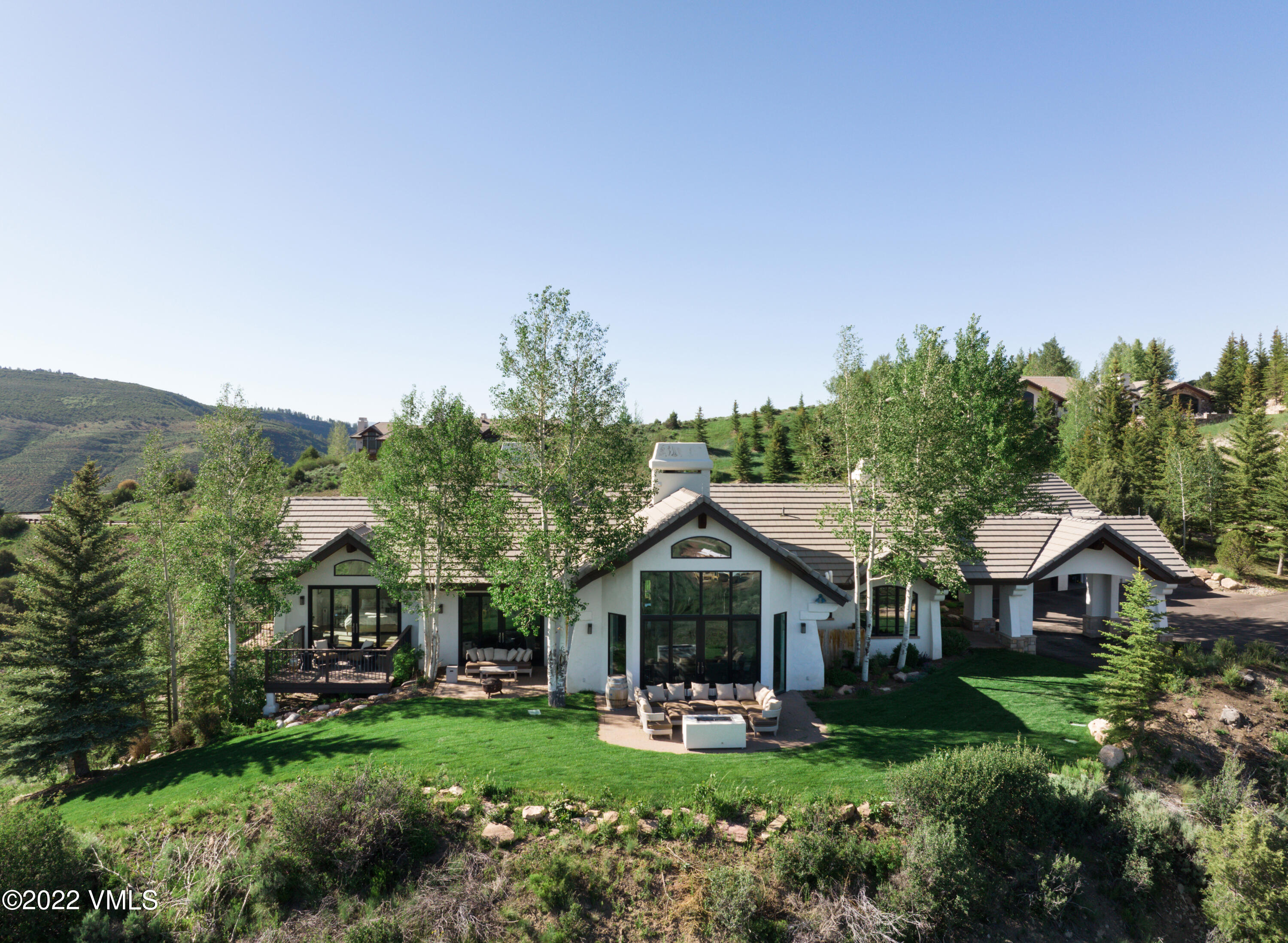 100 Casteel Ridge Edwards, CO 81632 - Photo 1 of 36 a front view of a house with garden