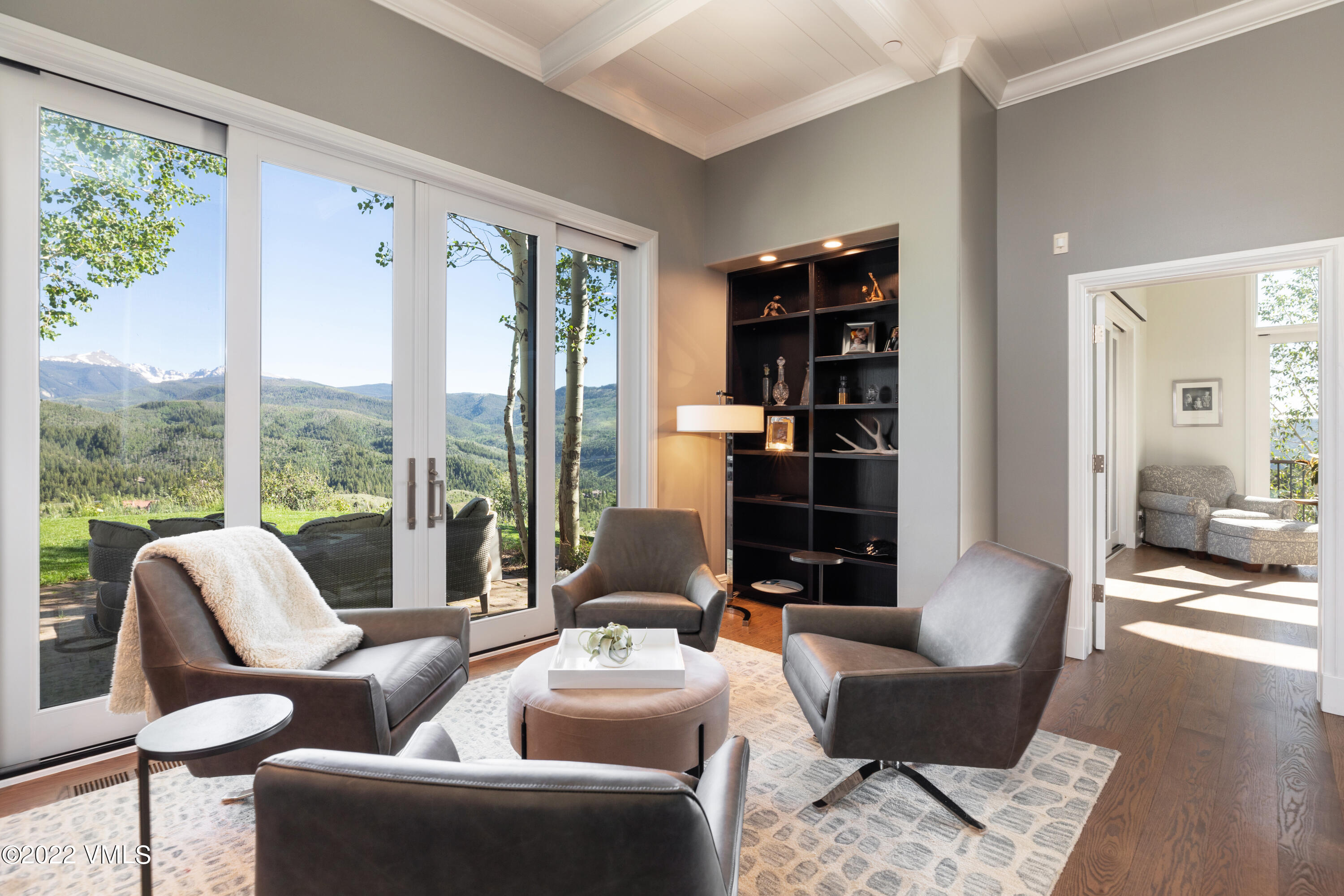 100 Casteel Ridge Edwards, CO 81632 - Photo 12 of 36 a living room with furniture and a floor to ceiling window