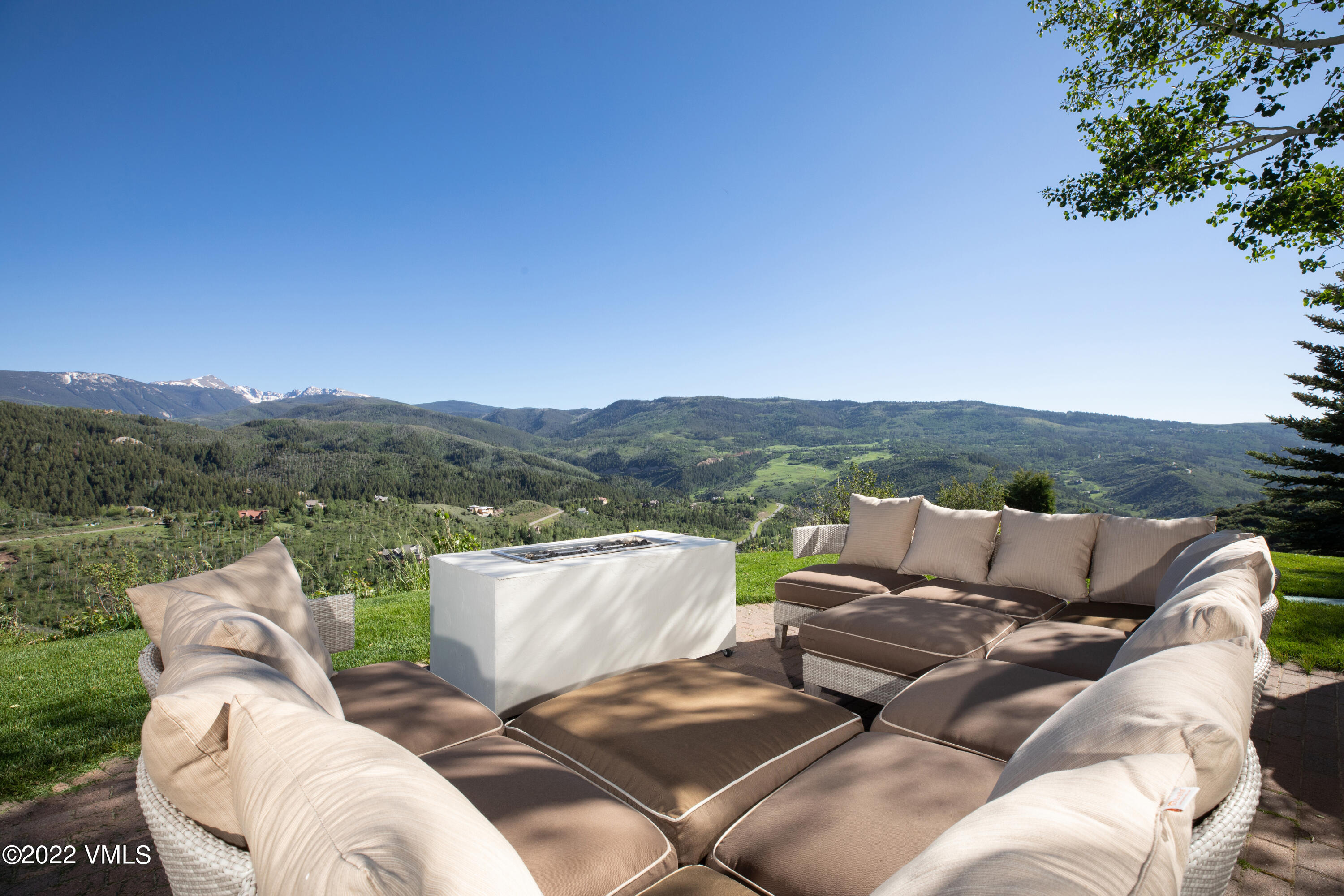 100 Casteel Ridge Edwards, CO 81632 - Photo 15 of 36 a view of a terrace with couches and wooden fence