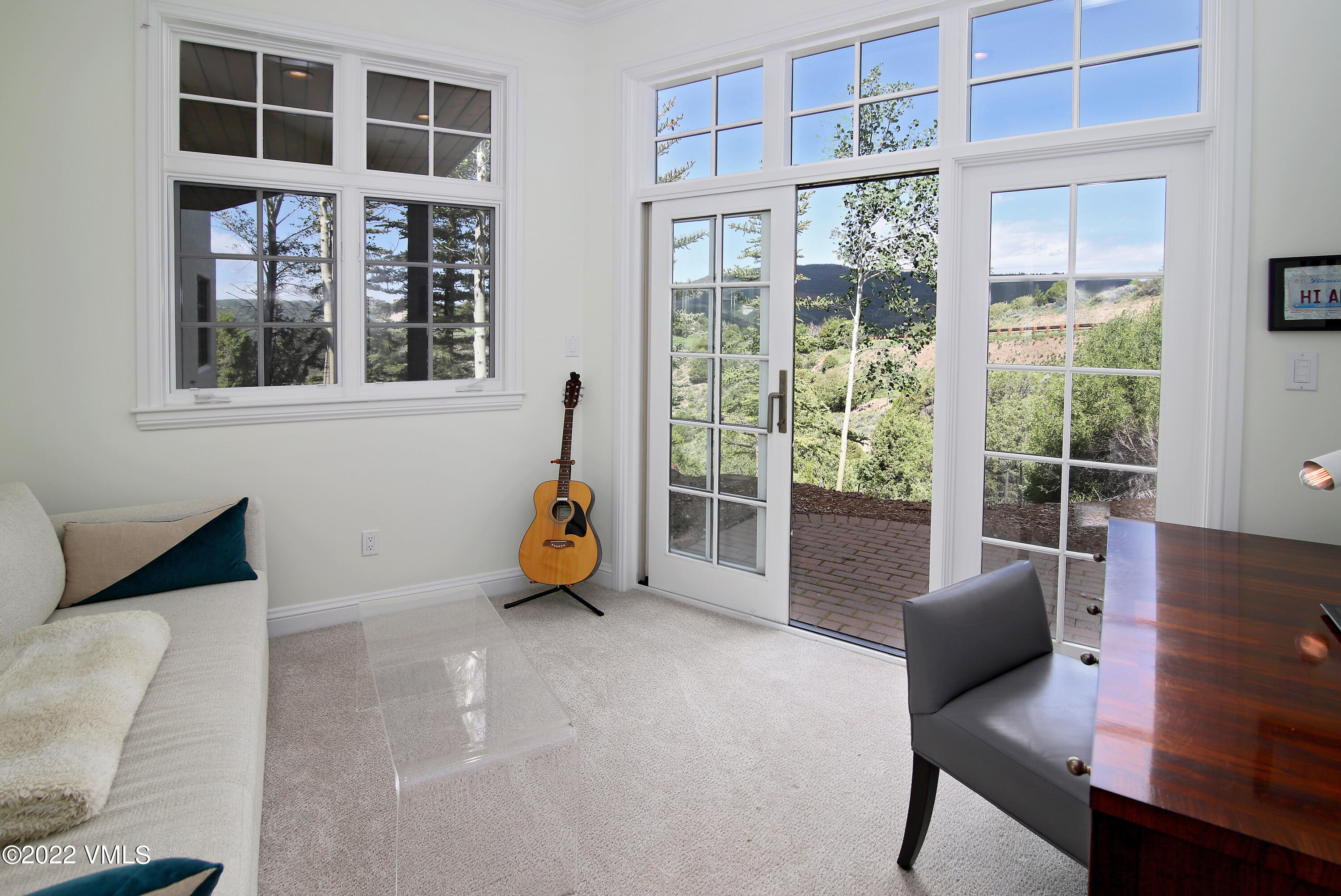 100 Casteel Ridge Edwards, CO 81632 - Photo 23 of 36 a bedroom with furniture and a large window