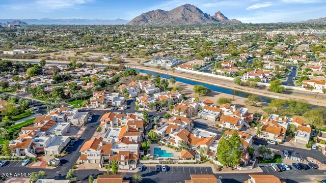 an aerial view of residential building and trees