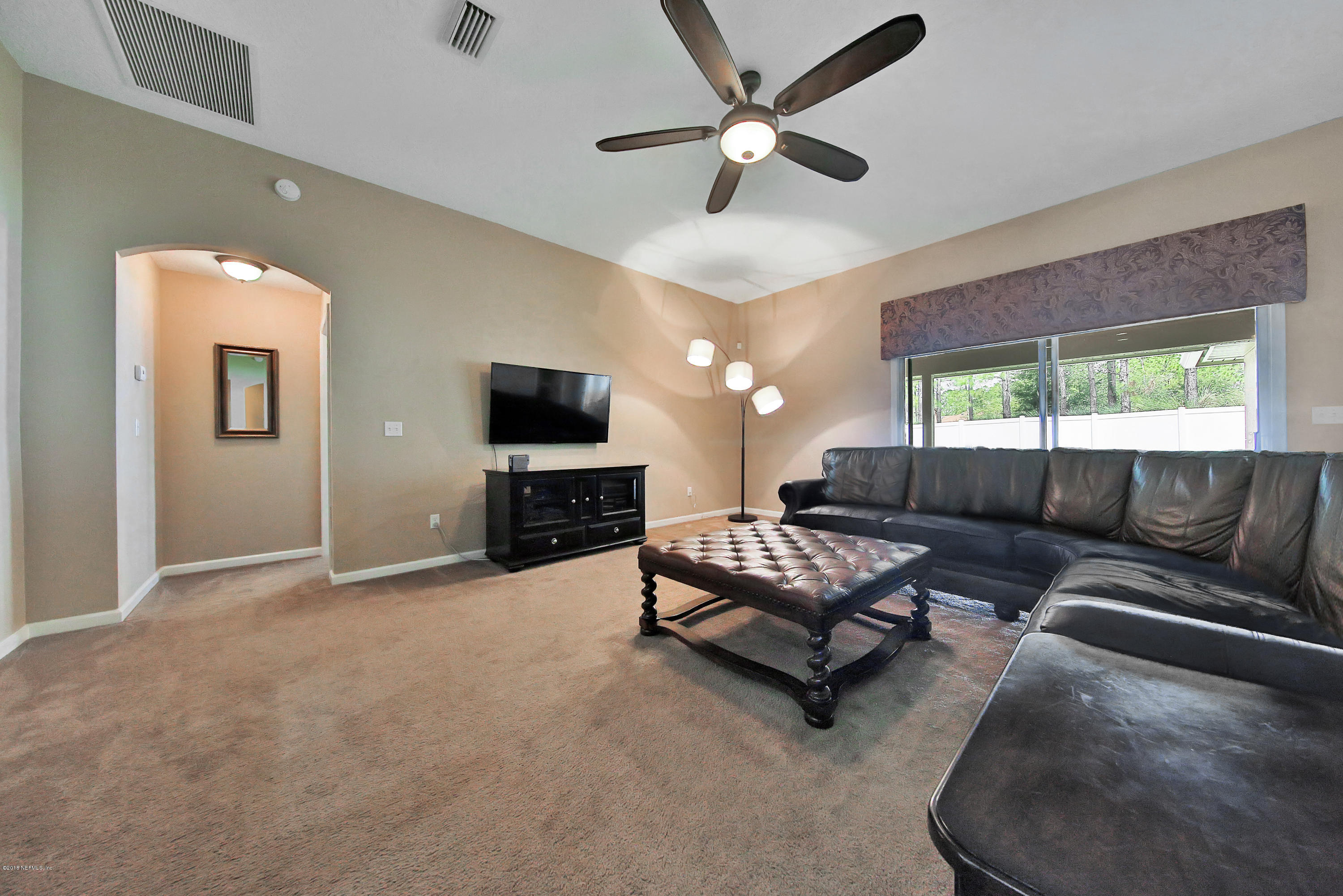 616 Porta Rosa Circle St. Augustine, FL 32092 - Photo 4 of 38 Family Room with Access to Covered Lanai