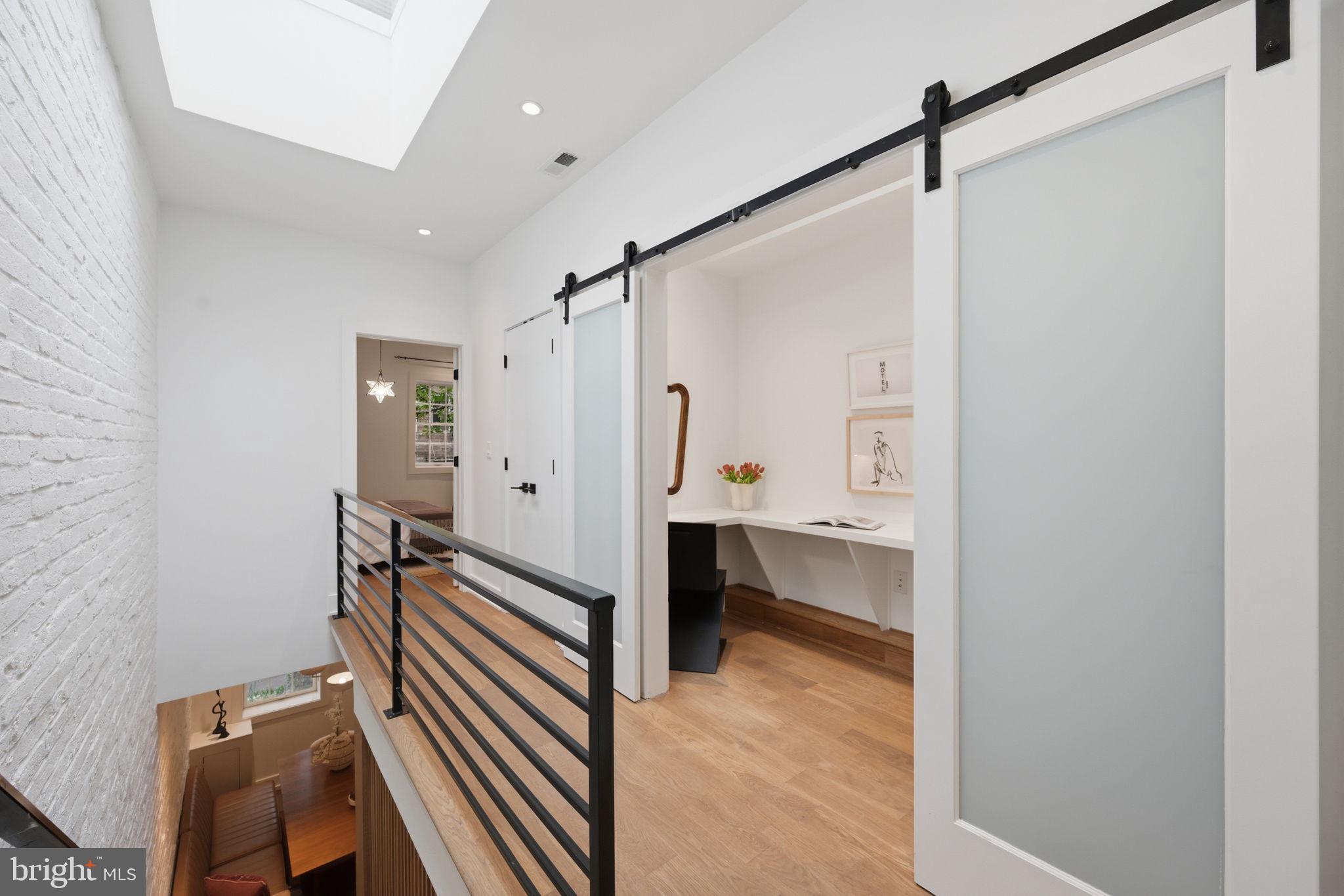 445 Ridge Street Northwest Washington, DC 20001 - Photo 20 of 39 Modern hallway with sleek design.