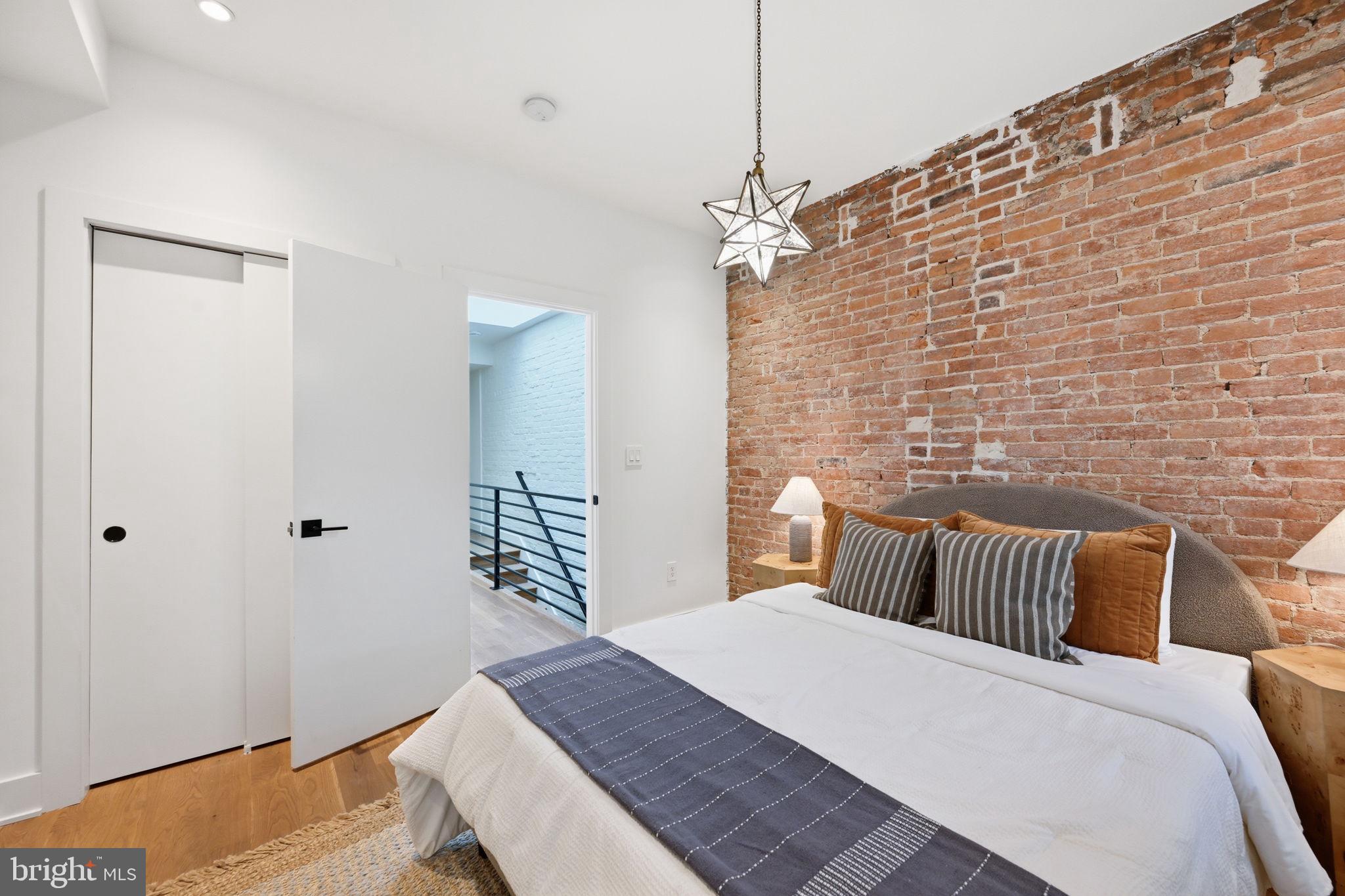 445 Ridge Street Northwest Washington, DC 20001 - Photo 24 of 39 Chic urban retreat with exposed brick.
