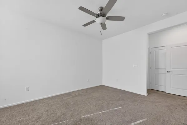a view of a big room with carpet