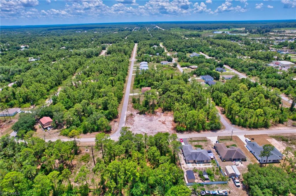 2123 Jefferson Avenue Alva, FL 33920 - Photo 15 of 20 an aerial view of residential house with outdoor space and trees all around
