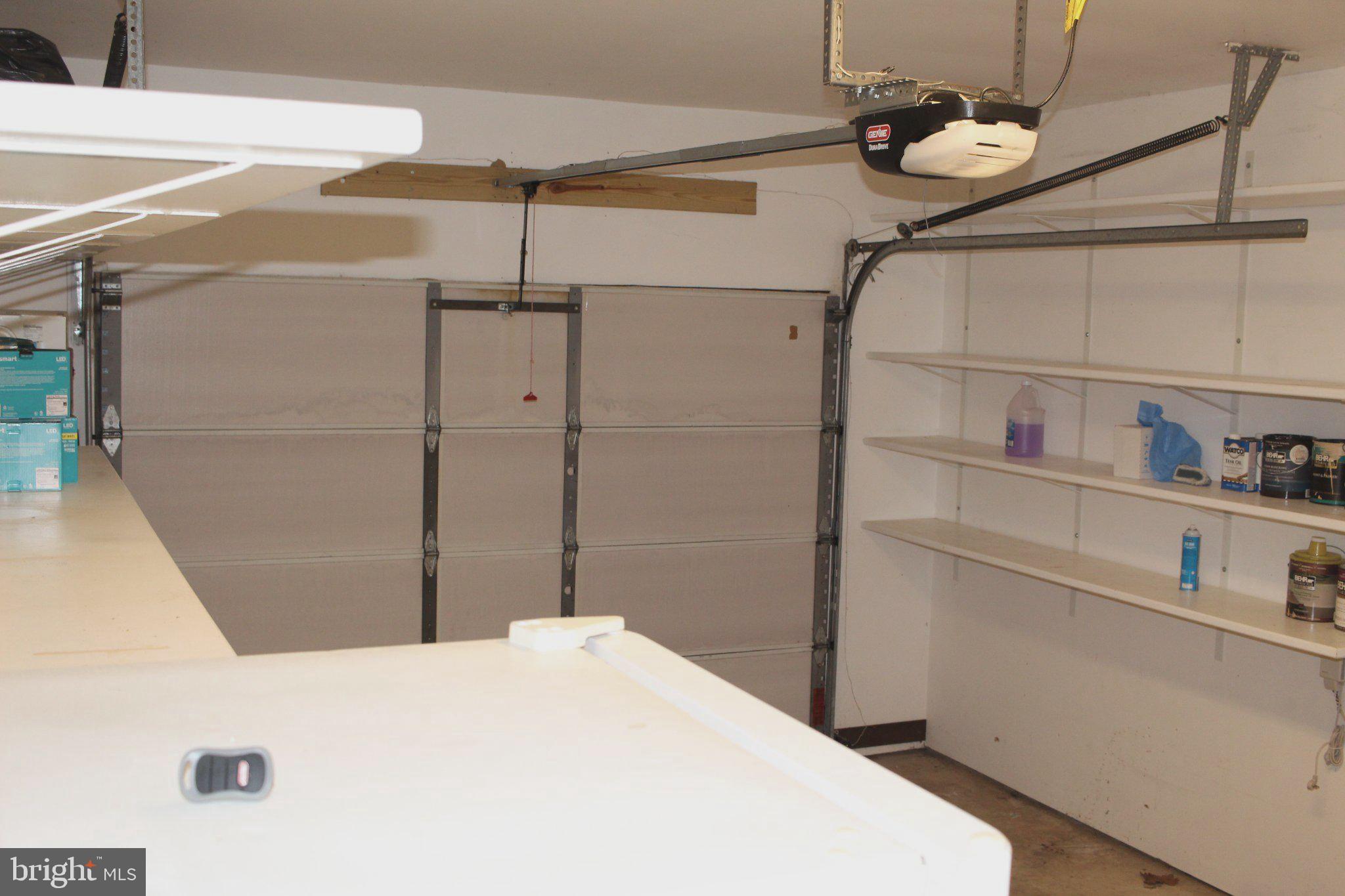4511 Sudley Road Gainesville, VA 20155 - Photo 12 of 16 Spacious garage with ample storage.