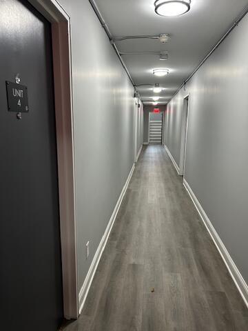 114 Grove Street, Unit 12 Stamford, CT 06901 - Photo 6 of 13 a view of hallway with stairs