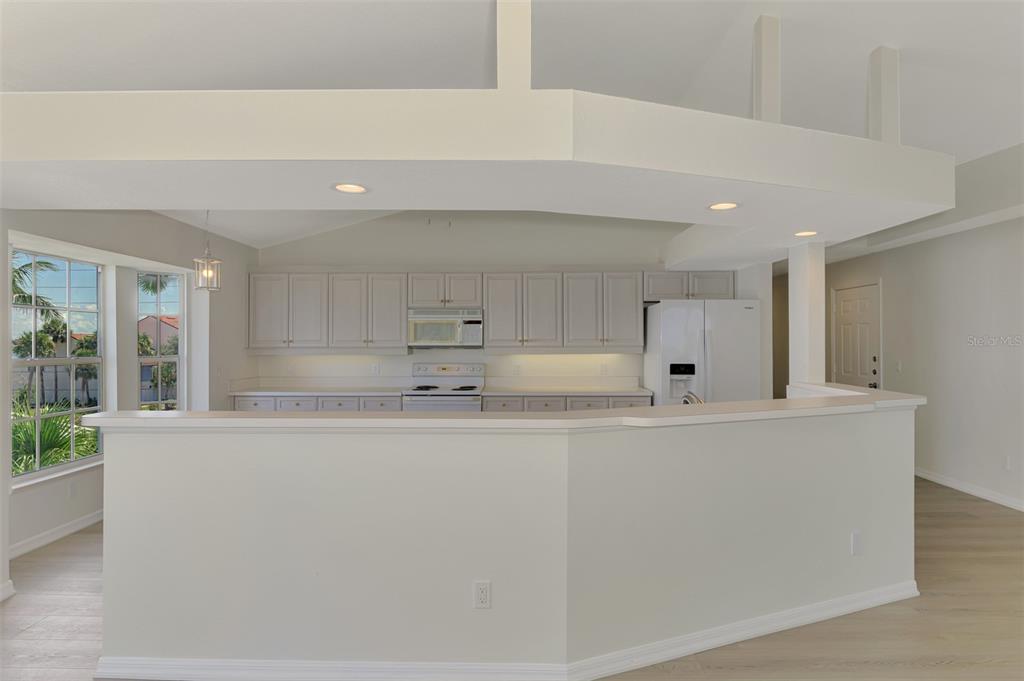 1380 Beach Road, Unit 4 Englewood, FL 34223 - Photo 18 of 47 a view of kitchen with stainless steel appliances cabinets