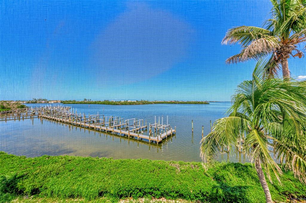 1380 Beach Road, Unit 4 Englewood, FL 34223 - Photo 39 of 47 a view of a lake with a city view