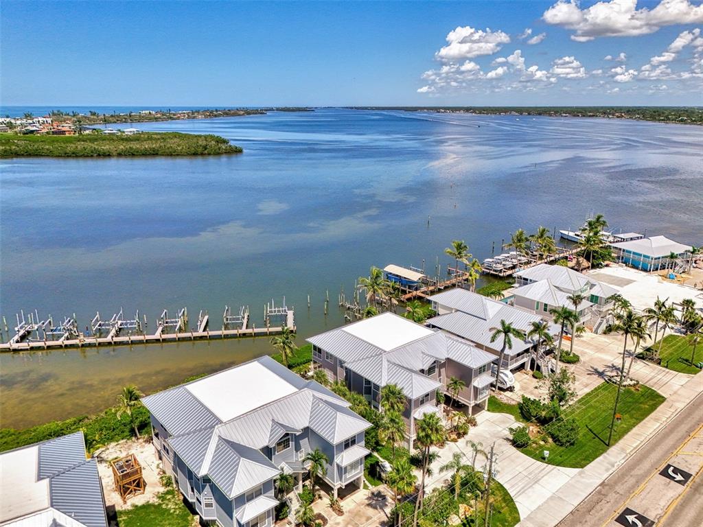 1380 Beach Road, Unit 4 Englewood, FL 34223 - Photo 4 of 47 an aerial view of a house with a ocean view