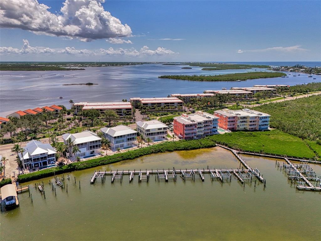 1380 Beach Road, Unit 4 Englewood, FL 34223 - Photo 43 of 47 a view of an ocean with city