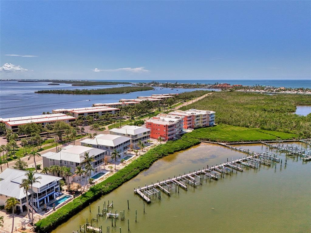 1380 Beach Road, Unit 4 Englewood, FL 34223 - Photo 46 of 47 a view of a city with an ocean
