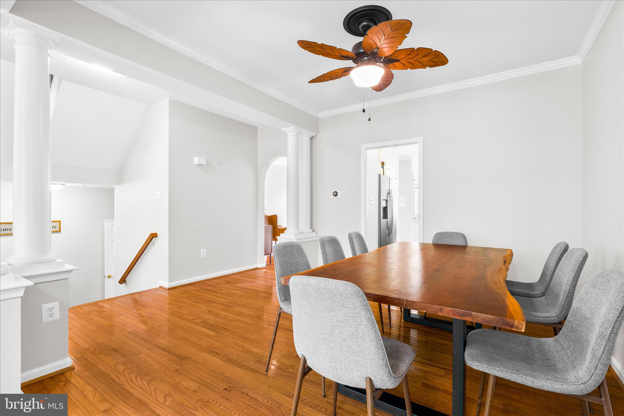 2442 Rippling Brook Road Frederick, MD 21701 - Photo 11 of 85 a view of a dining room with furniture and wooden floor