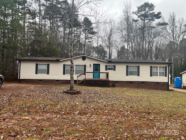 104 Freeze Meadows Road China Grove, NC 28023 - Photo 1 of 22 a house that has a tree in front of a house