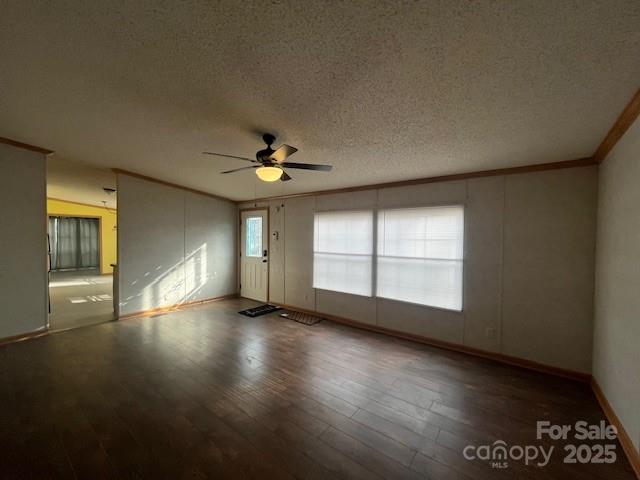 104 Freeze Meadows Road China Grove, NC 28023 - Photo 3 of 22 an empty room with wooden floor and windows