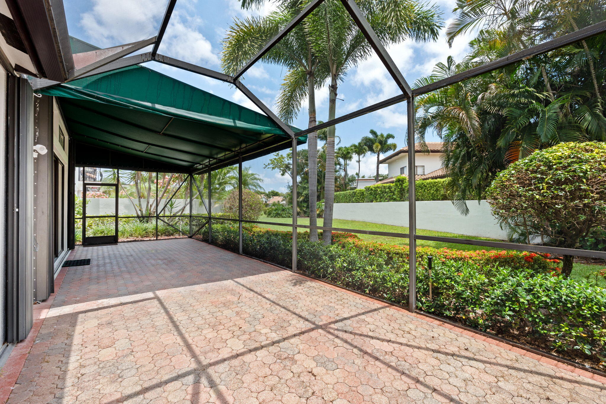 6517 Via Rosa Boca Raton, FL 33433 - Photo 31 of 38 Oversized Screened and Covered Lanai