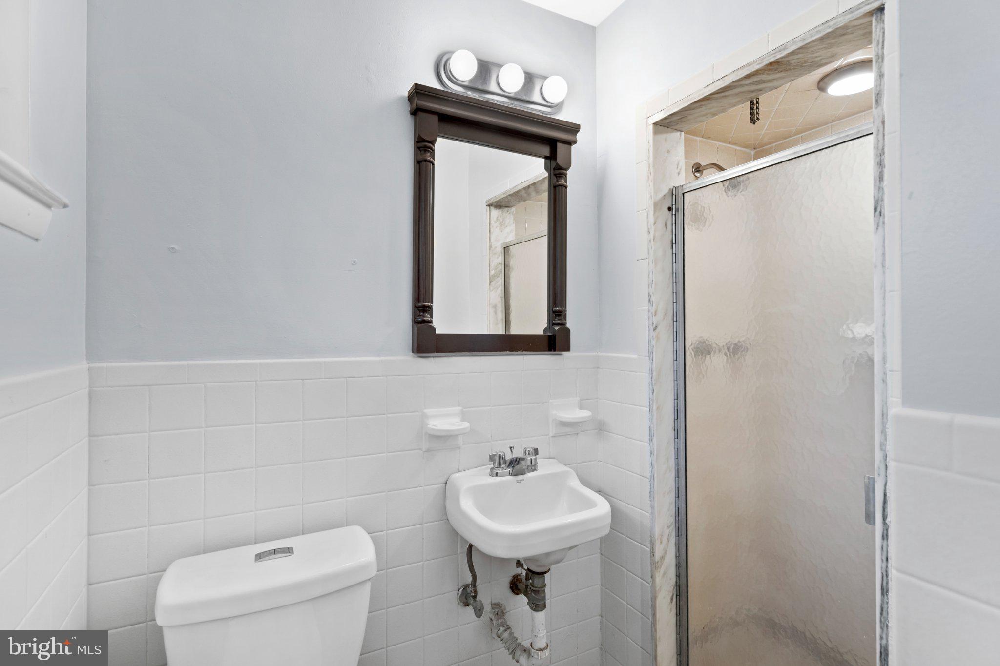 609 Foster Road Cheltenham, PA 19012 - Photo 38 of 44 Charming bathroom with modern touches.