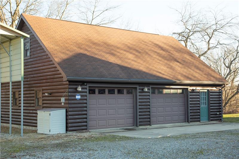 3270 Rustic Lodge Road Indiana, PA 15701 - Photo 7 of 25 a front view of a house with a garage