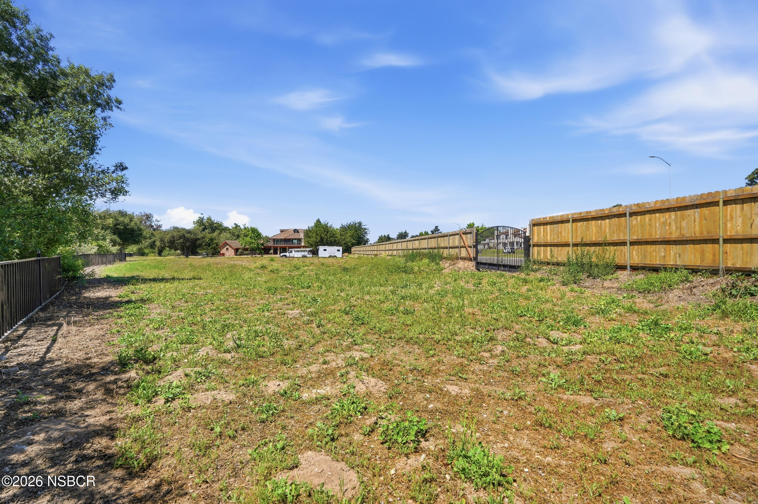 140 East Rice Ranch Road Santa Maria, CA 93455 - Photo 40 of 44 a yard with trees in the background