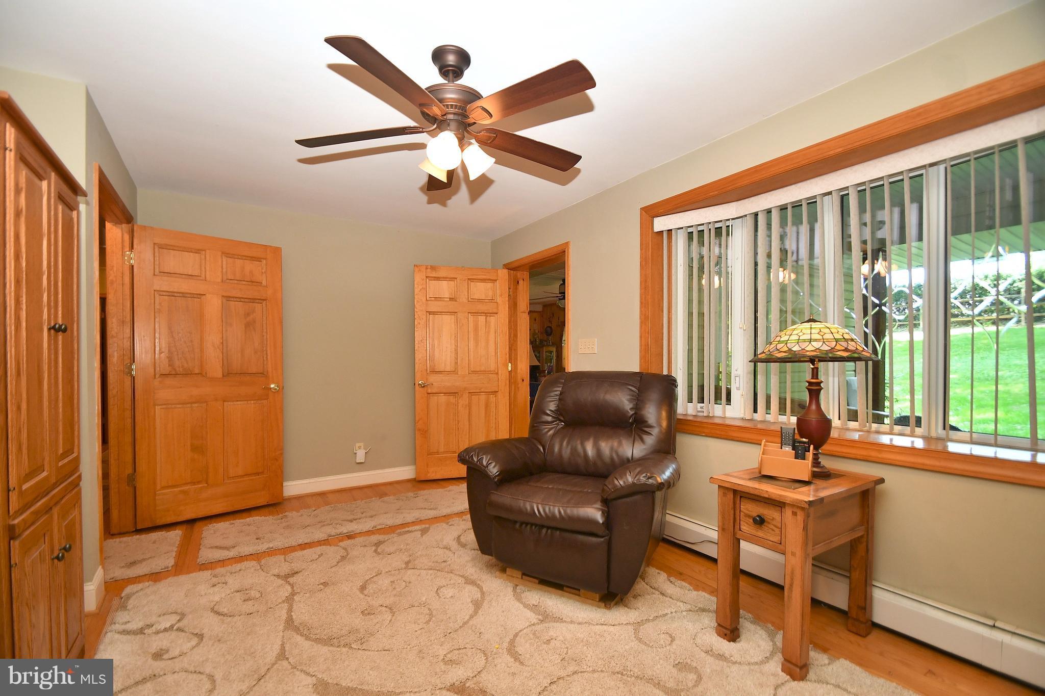 928 West Ring Factory Road Joppa, MD 21085 - Photo 13 of 30 Living room with hardwood floors and large window