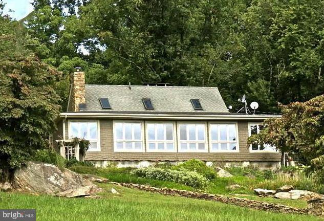 679 Fodderstack Road Flint Hill, VA 22640 - Photo 2 of 24 Front of the house with windows to the view